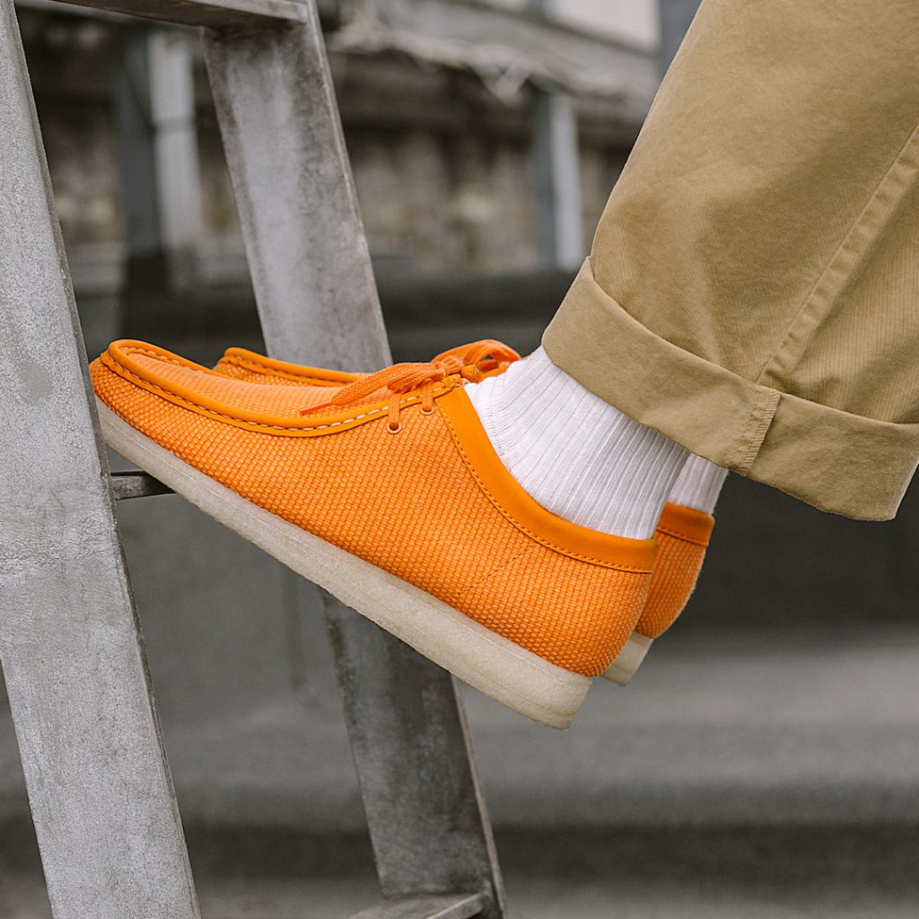 Orange wallabee clarks sales