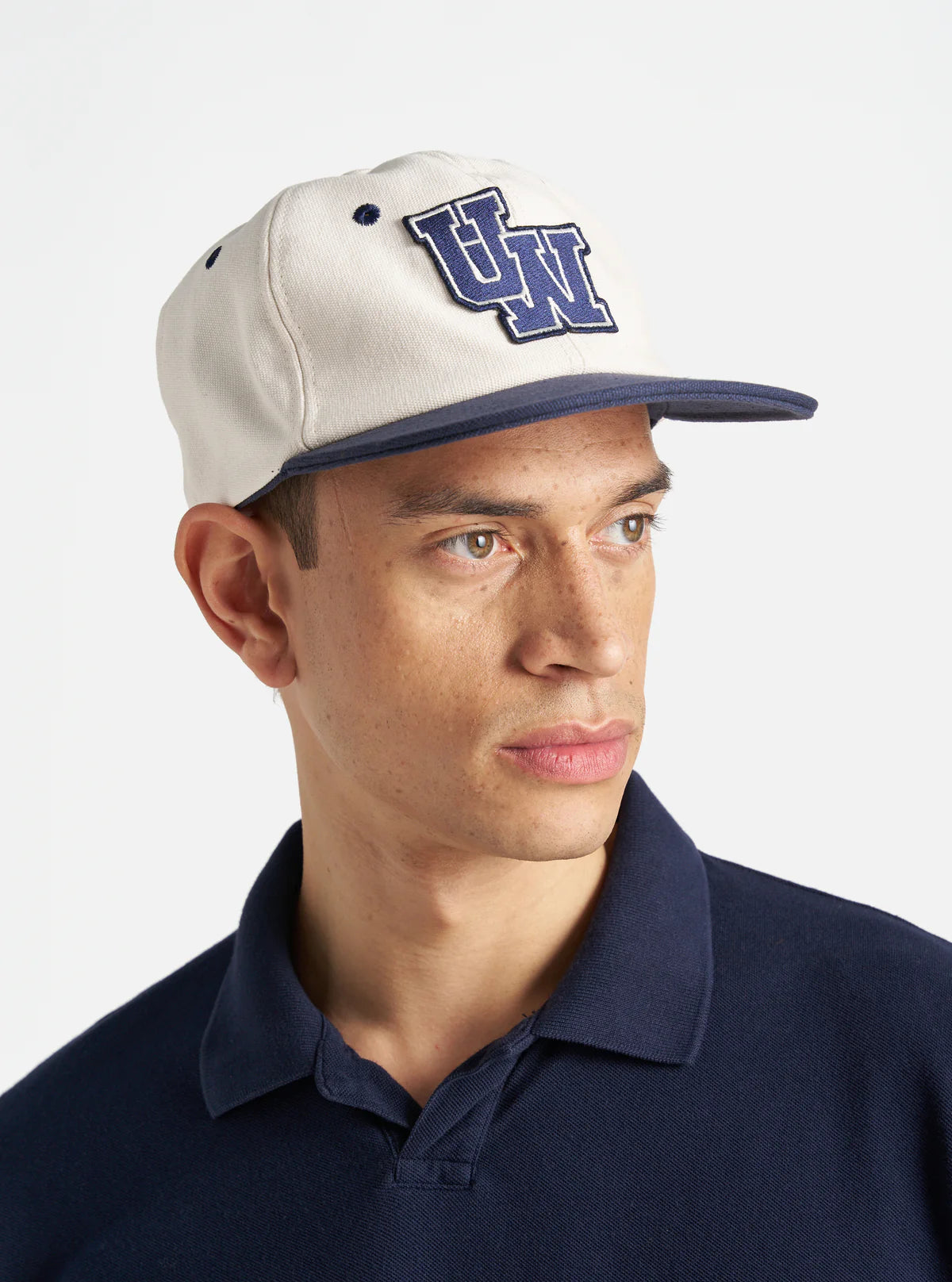 UNIVERSAL WORKS Baseball Hat in Ecru Navy Canvas