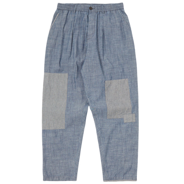 UNIVERSAL WORKS Patched Pleated Track Pant In Indigo