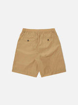 UNIVERSAL WORKS Pleated Track Short In Sand Recycled Nylon Tech